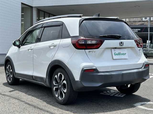 ホンダ フィット e:HEVクロスター 長崎県 2020(令2)年 4.6万km プラチナホワイトパール 純正HDDナビ(BT/FM/AM/フルセグ/CD/DVD)/プッシュスタート/スマートキー/スペアキー(1本)/渋滞追従機能付アダプティブクルーズコントロール/ナビ連動型ドラレコ/ビルトインETC/ステアリングスイッチ/純正フロアマット/純正16インチアルミホイール/ABS/VSA/LKAS/踏み間違い衝突軽減システム/CMBS/オートライト/パーキングセンサーシステム/SRSダブル・サイドエアバッグ/SRSカーテンエアバッグ/ISOFIX/イモビライザーシステム/取扱説明書/保証書/記録簿