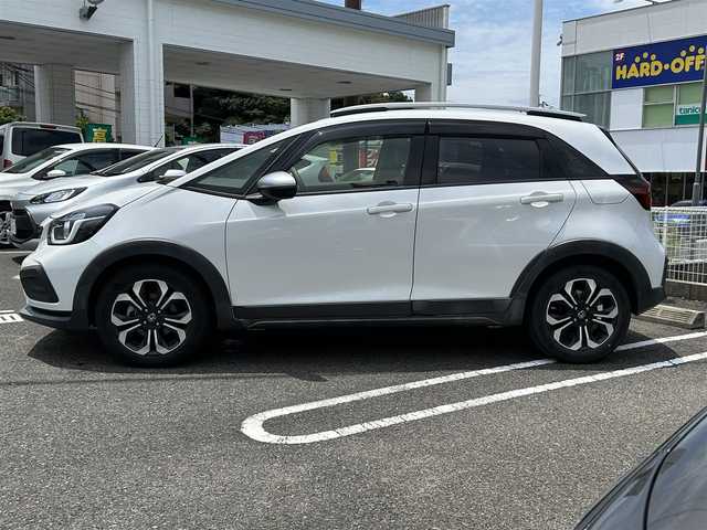ホンダ フィット e:HEVクロスター 長崎県 2020(令2)年 4.6万km プラチナホワイトパール 純正HDDナビ(BT/FM/AM/フルセグ/CD/DVD)/プッシュスタート/スマートキー/スペアキー(1本)/渋滞追従機能付アダプティブクルーズコントロール/ナビ連動型ドラレコ/ビルトインETC/ステアリングスイッチ/純正フロアマット/純正16インチアルミホイール/ABS/VSA/LKAS/踏み間違い衝突軽減システム/CMBS/オートライト/パーキングセンサーシステム/SRSダブル・サイドエアバッグ/SRSカーテンエアバッグ/ISOFIX/イモビライザーシステム/取扱説明書/保証書/記録簿