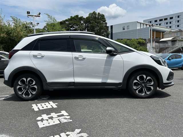 ホンダ フィット e:HEVクロスター 長崎県 2020(令2)年 4.6万km プラチナホワイトパール 純正HDDナビ(BT/FM/AM/フルセグ/CD/DVD)/プッシュスタート/スマートキー/スペアキー(1本)/渋滞追従機能付アダプティブクルーズコントロール/ナビ連動型ドラレコ/ビルトインETC/ステアリングスイッチ/純正フロアマット/純正16インチアルミホイール/ABS/VSA/LKAS/踏み間違い衝突軽減システム/CMBS/オートライト/パーキングセンサーシステム/SRSダブル・サイドエアバッグ/SRSカーテンエアバッグ/ISOFIX/イモビライザーシステム/取扱説明書/保証書/記録簿
