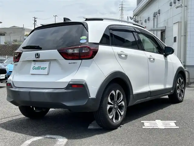 ホンダ フィット e:HEVクロスター 長崎県 2020(令2)年 4.6万km プラチナホワイトパール 純正HDDナビ(BT/FM/AM/フルセグ/CD/DVD)/プッシュスタート/スマートキー/スペアキー(1本)/渋滞追従機能付アダプティブクルーズコントロール/ナビ連動型ドラレコ/ビルトインETC/ステアリングスイッチ/純正フロアマット/純正16インチアルミホイール/ABS/VSA/LKAS/踏み間違い衝突軽減システム/CMBS/オートライト/パーキングセンサーシステム/SRSダブル・サイドエアバッグ/SRSカーテンエアバッグ/ISOFIX/イモビライザーシステム/取扱説明書/保証書/記録簿