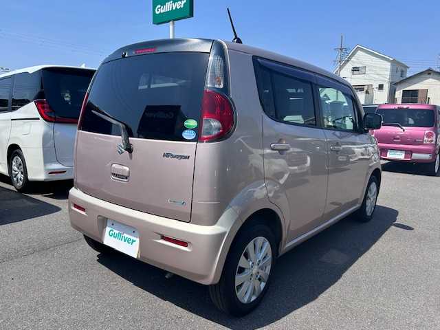 スズキ ＭＲワゴン X 鳥取県 2015(平27)年 7.2万km シャンパンピンクPM 純正ディスプレイオーディオ/バックカメラ/ABS/盗難防止装置/アイドリングストップ/純正アルミホイール/社外フロアマット/ベンチシート/ETC/ハロゲンヘッドライト/パワーステアリング/パワーウインドウ/スマートキー×2