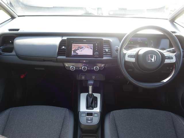 ホンダ フィット e:HEVホーム カーサ 熊本県 2021(令3)年 5.9万km メテオロイドグレーメタリック ワンオーナー/ホンダセンシング/純正Gathersディスプレイオーディオ/　CD/BT/USB/iPod/ワンセグTV/バックカメラ/ETC/純正ドライブレコーダー/前席シートヒーター/前後コーナーセンサー/純正ブラッククリア塗装16インチAW/プッシュスタート/スマートキー/純正フロアマット/純正ドアバイザー/保証書