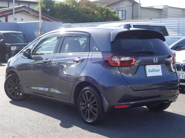 ホンダ フィット e:HEVホーム カーサ 熊本県 2021(令3)年 5.9万km メテオロイドグレーメタリック ワンオーナー/ホンダセンシング/純正Gathersディスプレイオーディオ/　CD/BT/USB/iPod/ワンセグTV/バックカメラ/ETC/純正ドライブレコーダー/前席シートヒーター/前後コーナーセンサー/純正ブラッククリア塗装16インチAW/プッシュスタート/スマートキー/純正フロアマット/純正ドアバイザー/保証書