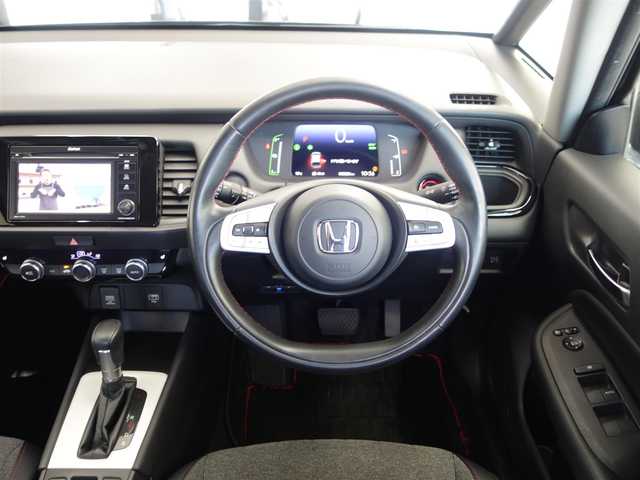 ホンダ フィット e:HEVホーム カーサ 熊本県 2021(令3)年 5.9万km メテオロイドグレーメタリック ワンオーナー/ホンダセンシング/純正Gathersディスプレイオーディオ/　CD/BT/USB/iPod/ワンセグTV/バックカメラ/ETC/純正ドライブレコーダー/前席シートヒーター/前後コーナーセンサー/純正ブラッククリア塗装16インチAW/プッシュスタート/スマートキー/純正フロアマット/純正ドアバイザー/保証書