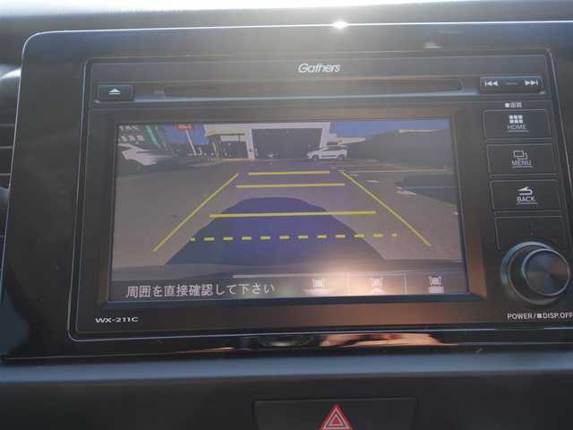 ホンダ フィット e:HEVホーム カーサ 熊本県 2021(令3)年 5.9万km メテオロイドグレーメタリック ワンオーナー/ホンダセンシング/純正Gathersディスプレイオーディオ/　CD/BT/USB/iPod/ワンセグTV/バックカメラ/ETC/純正ドライブレコーダー/前席シートヒーター/前後コーナーセンサー/純正ブラッククリア塗装16インチAW/プッシュスタート/スマートキー/純正フロアマット/純正ドアバイザー/保証書