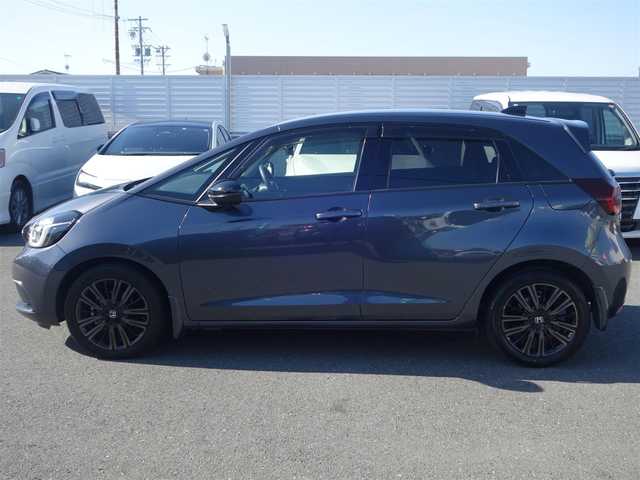 ホンダ フィット e:HEVホーム カーサ 熊本県 2021(令3)年 5.9万km メテオロイドグレーメタリック ワンオーナー/ホンダセンシング/純正Gathersディスプレイオーディオ/　CD/BT/USB/iPod/ワンセグTV/バックカメラ/ETC/純正ドライブレコーダー/前席シートヒーター/前後コーナーセンサー/純正ブラッククリア塗装16インチAW/プッシュスタート/スマートキー/純正フロアマット/純正ドアバイザー/保証書