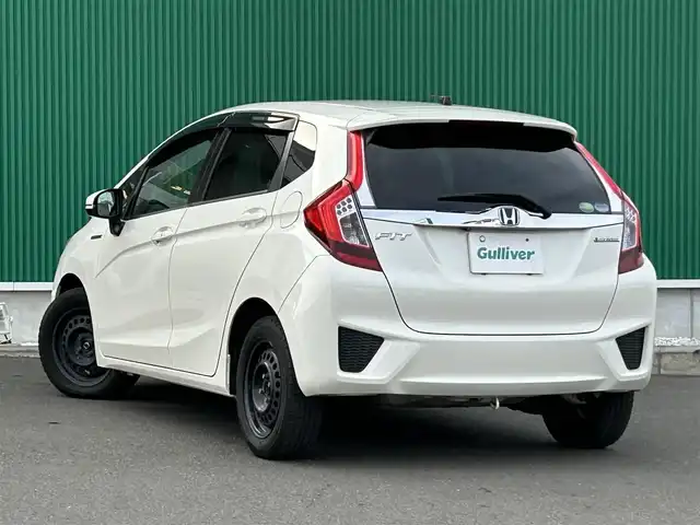 ホンダ フィット ハイブリット Fパッケージ 宮城県 2015(平27)年 15.3万km プレミアムホワイトパール 社外SDメモリーナビ/・Bluetooth/・ワンセグTV/・CD/DVD/ETC/バックカメラ/コーナーセンサー/横滑り防止装置/オートライト/電動格納ミラー/純正フロアマット/オートエアコン/盗難防止装置/ドアバイザー/アイドリングストップ/プッシュスタート＆スペアキー