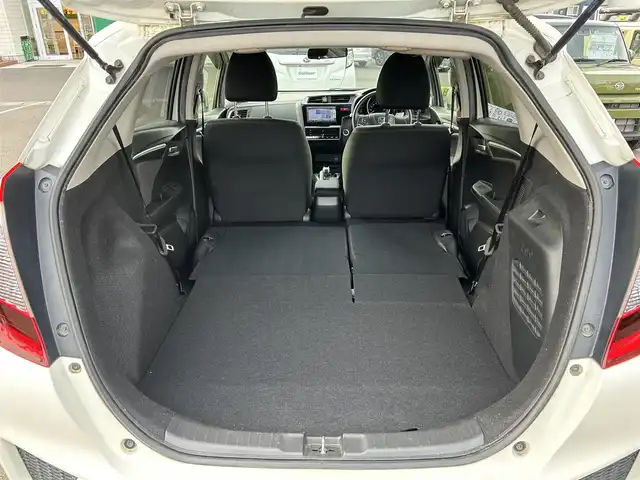 ホンダ フィット ハイブリット Fパッケージ 宮城県 2015(平27)年 15.3万km プレミアムホワイトパール 社外SDメモリーナビ/・Bluetooth/・ワンセグTV/・CD/DVD/ETC/バックカメラ/コーナーセンサー/横滑り防止装置/オートライト/電動格納ミラー/純正フロアマット/オートエアコン/盗難防止装置/ドアバイザー/アイドリングストップ/プッシュスタート＆スペアキー