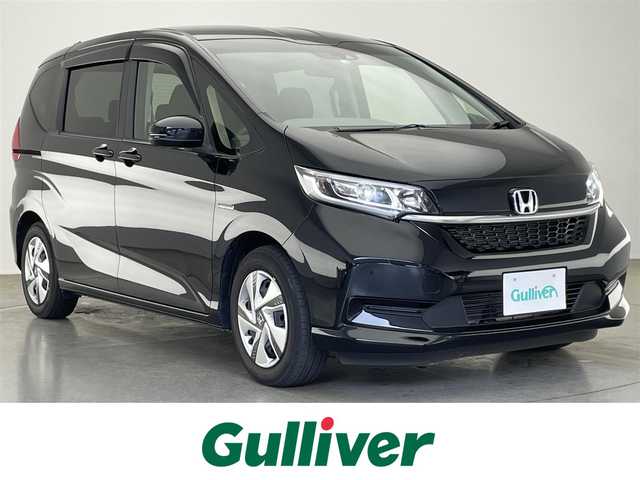 ホンダ フリード ハイブリット G ホンダセンシング 愛知県 2022(令4)年 2.2万km クリスタルブラックパール 純正ナビ　Ｂｌｕｅｔｏｏｔｈ　ＣＤ　ＵＳＢ　バックカメラ　両側パワースライドドア　ＥＴＣ　ホンダセンシング　衝突軽減装置　追従クルコン　ＬＥＤオートライト　ステアリングスイッチ　ハンドル支援　禁煙車