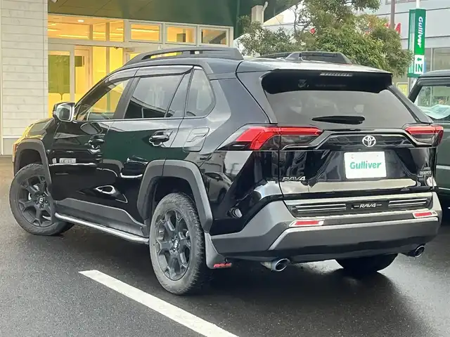 トヨタ ＲＡＶ４ アドベンチャー オフロードPKG 島根県 2021(令3)年 2.7万km アティチュードブラックマイカ 4WD/社外９型ナビ(ALPINE)　/(AM/FM/フルセグTV/ＤＶＤ再生/Ｂｌｕｅｔｏｏｔｈ接続)　/前後ドライブレコーダー　/ＥＴＣ　/バックカメラ　/レーダークルーズコントロール　/前後コーナーセンサー　/レーンアシスト/プリクラッシュセーフティ/レザーシート(黒)　/運転席パワーシート/電動パーキングブレーキ/オートホールド　/オートハイビーム／ライト　/純正ＬＥＤライト/純正18インチアルミホイール/純正フロアマット/スペアキー1本