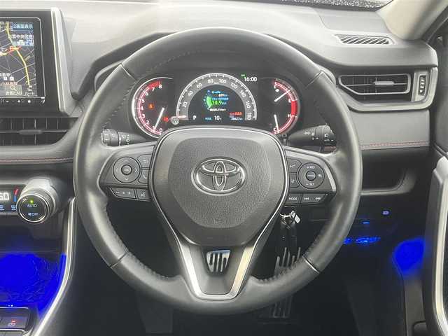 トヨタ ＲＡＶ４ アドベンチャー オフロードPKG 島根県 2021(令3)年 2.7万km アティチュードブラックマイカ 4WD/社外９型ナビ(ALPINE)　/(AM/FM/フルセグTV/ＤＶＤ再生/Ｂｌｕｅｔｏｏｔｈ接続)　/前後ドライブレコーダー　/ＥＴＣ　/バックカメラ　/レーダークルーズコントロール　/前後コーナーセンサー　/レーンアシスト/プリクラッシュセーフティ/レザーシート(黒)　/運転席パワーシート/電動パーキングブレーキ/オートホールド　/オートハイビーム／ライト　/純正ＬＥＤライト/純正18インチアルミホイール/純正フロアマット/スペアキー1本