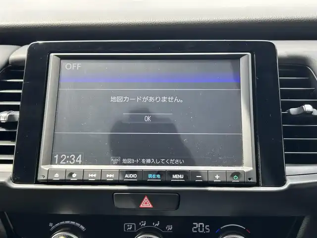 ホンダ フィット e:HEVホーム 千葉県 2020(令2)年 0.6万km シャイニンググレーM ホンダセンシング/・衝突軽減ブレーキ/・レーンキープアシスト/・オートマチックハイビーム/・歩行者事故低減ステアリング/・アダプティブクルーズコントロール/純正8インチSDナビ【VXM-205VFEi】/・CD/DVD/Bluetooth/フルセグTV/バックカメラ/スマートキー/前後コーナーセンサー/前後ドライブレコーダー/ハーフレザーシート/ETC/純正LEDヘッドライト/ヘッドライトレベライザー/サイド＆カーテンエアバッグ/新車時保証書＆取扱説明書