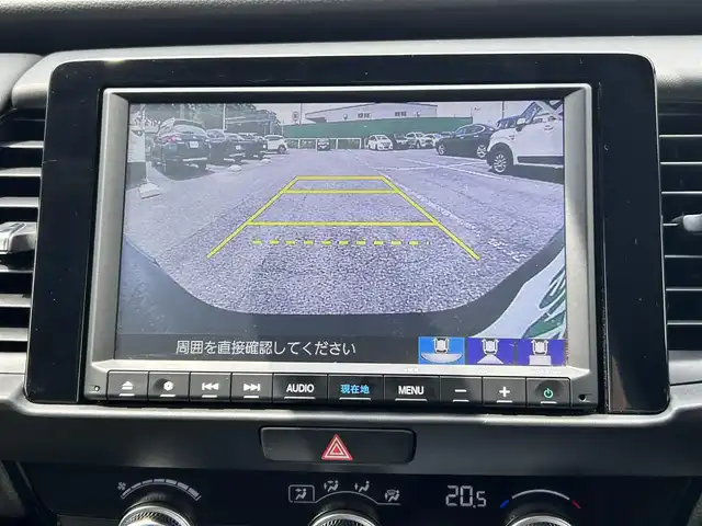 ホンダ フィット e:HEVホーム 千葉県 2020(令2)年 0.6万km シャイニンググレーM ホンダセンシング/・衝突軽減ブレーキ/・レーンキープアシスト/・オートマチックハイビーム/・歩行者事故低減ステアリング/・アダプティブクルーズコントロール/純正8インチSDナビ【VXM-205VFEi】/・CD/DVD/Bluetooth/フルセグTV/バックカメラ/スマートキー/前後コーナーセンサー/前後ドライブレコーダー/ハーフレザーシート/ETC/純正LEDヘッドライト/ヘッドライトレベライザー/サイド＆カーテンエアバッグ/新車時保証書＆取扱説明書