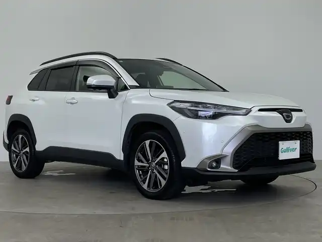 トヨタ カローラ クロス ハイブリッド Z 鹿児島県 2024(令6)年 1.3万km プラチナホワイトパールマイカ 純正ナビゲーションシステム/Bluetooth/フルセグTV/前後ドライブレコーダー/デジタルインナーミラー/アラウンドビューモニター/電子制御パーキング/駐車アシスト/パワーシート/DNシートヒーター/電動リアゲート/クルーズコントロール/トヨタセーフティセンス/SOSコール/コーナーセンサー/レーンキープアシスト/盗難防止装置/ETC2.0/電動パーキングブレーキ/前後ドライブレコーダー/デジタルインナーミラー/オートホールド