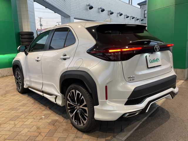 トヨタ ヤリスクロス ハイブリッド Z 福島県 2024(令6)年 1.8万km プラチナホワイトパールマイカ ワンオーナー車/登録時走行距離17/241km/モデリスタエアロ（ADVANCE ROBUST STYLE）/取扱説明書/記録簿/保証書/純正ディスプレイオーディオPlus/（コネクティッドナビ対応、8インチ）/〇フルセグTV（走行視聴不可）/〇Bluetooth/〇Applecarplay/〇ＨＤＭＩ接続端子/〇ＴｉｐｅＣ接続端子/ステアリングヒーター/パワーシート（Ｄ席）/シートヒーター（Ｄ＋Ｎ席）/純正ETC2.0/全方位カメラ/クルーズコントロール（追従機能付き）/ＢＳＭ/ＰＤＡ/ＲＣＴＡ/ＰＡＳＢ/安心降車アシスト/ＲＳＡ/クリアランスソナー（前後）/社外ナビ（前後）/スマートキー/スペアキー（1本）/寒冷地仕様/センターコンソール/AAC