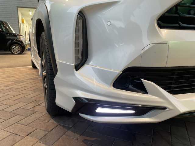 トヨタ ヤリスクロス ハイブリッド Z 福島県 2024(令6)年 1.8万km プラチナホワイトパールマイカ ワンオーナー車/登録時走行距離17/241km/モデリスタエアロ（ADVANCE ROBUST STYLE）/取扱説明書/記録簿/保証書/純正ディスプレイオーディオPlus/（コネクティッドナビ対応、8インチ）/〇フルセグTV（走行視聴不可）/〇Bluetooth/〇Applecarplay/〇ＨＤＭＩ接続端子/〇ＴｉｐｅＣ接続端子/ステアリングヒーター/パワーシート（Ｄ席）/シートヒーター（Ｄ＋Ｎ席）/純正ETC2.0/全方位カメラ/クルーズコントロール（追従機能付き）/ＢＳＭ/ＰＤＡ/ＲＣＴＡ/ＰＡＳＢ/安心降車アシスト/ＲＳＡ/クリアランスソナー（前後）/社外ナビ（前後）/スマートキー/スペアキー（1本）/寒冷地仕様/センターコンソール/AAC