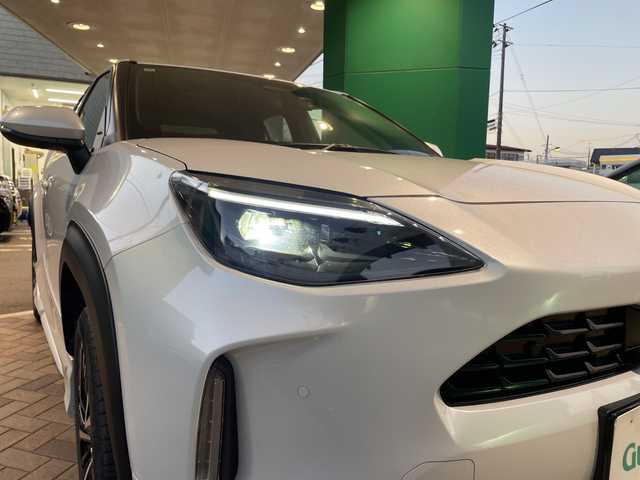 トヨタ ヤリスクロス ハイブリッド Z 福島県 2024(令6)年 1.8万km プラチナホワイトパールマイカ ワンオーナー車/登録時走行距離17/241km/モデリスタエアロ（ADVANCE ROBUST STYLE）/取扱説明書/記録簿/保証書/純正ディスプレイオーディオPlus/（コネクティッドナビ対応、8インチ）/〇フルセグTV（走行視聴不可）/〇Bluetooth/〇Applecarplay/〇ＨＤＭＩ接続端子/〇ＴｉｐｅＣ接続端子/ステアリングヒーター/パワーシート（Ｄ席）/シートヒーター（Ｄ＋Ｎ席）/純正ETC2.0/全方位カメラ/クルーズコントロール（追従機能付き）/ＢＳＭ/ＰＤＡ/ＲＣＴＡ/ＰＡＳＢ/安心降車アシスト/ＲＳＡ/クリアランスソナー（前後）/社外ナビ（前後）/スマートキー/スペアキー（1本）/寒冷地仕様/センターコンソール/AAC