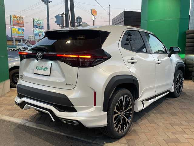 トヨタ ヤリスクロス ハイブリッド Z 福島県 2024(令6)年 1.8万km プラチナホワイトパールマイカ ワンオーナー車/登録時走行距離17/241km/モデリスタエアロ（ADVANCE ROBUST STYLE）/取扱説明書/記録簿/保証書/純正ディスプレイオーディオPlus/（コネクティッドナビ対応、8インチ）/〇フルセグTV（走行視聴不可）/〇Bluetooth/〇Applecarplay/〇ＨＤＭＩ接続端子/〇ＴｉｐｅＣ接続端子/ステアリングヒーター/パワーシート（Ｄ席）/シートヒーター（Ｄ＋Ｎ席）/純正ETC2.0/全方位カメラ/クルーズコントロール（追従機能付き）/ＢＳＭ/ＰＤＡ/ＲＣＴＡ/ＰＡＳＢ/安心降車アシスト/ＲＳＡ/クリアランスソナー（前後）/社外ナビ（前後）/スマートキー/スペアキー（1本）/寒冷地仕様/センターコンソール/AAC