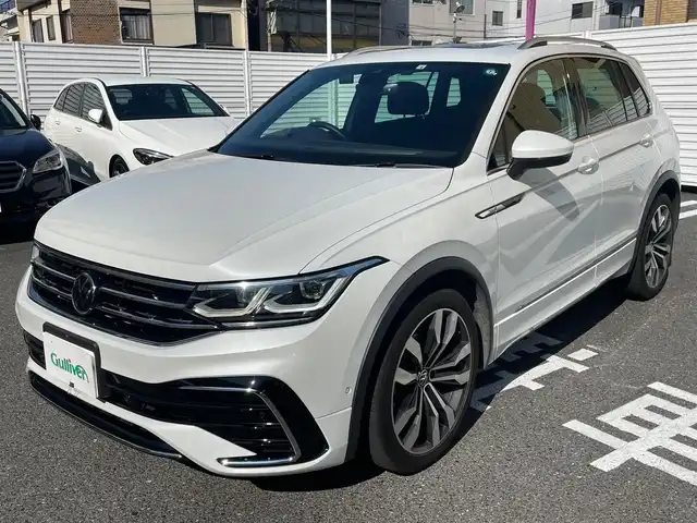 フォルクスワーゲン ＶＷ ティグアン TSI Rライン 広島県 2022(令4)年 1.9万km 白 /登録時走行距離/　　　　　　　18505キロ/ワンオーナー/サンルーフ/純正ナビ/全方位モニター/地デジ視聴可/黒革シート/シートヒーター/ハーマンカードン/パワーバックドア/HUD/ルーフレール/スペアキー×１/ビルトインETC/新車時整備手帳/　　【保証書】/取扱説明書/