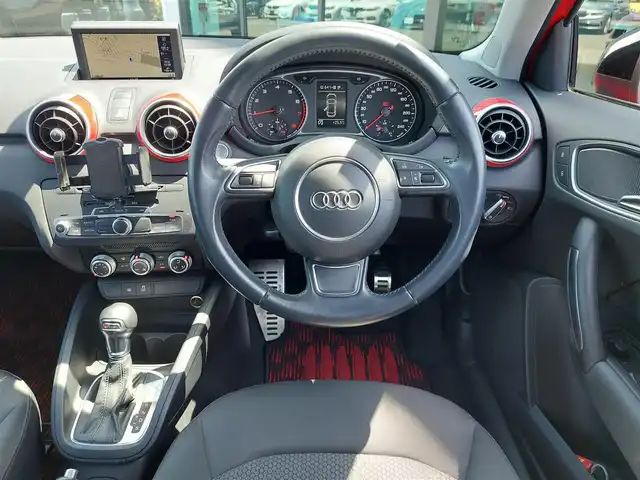 アウディ Ａ１ スポーツバック 1．4TFSI 東京都 2015(平27)年 2.6万km 赤 ・ワンオーナー/・プッシュスタート/・アイドリングストップ/・MTモード付きAT/・純正ナビ/・フルセグTV/・ETC/・前後ドライブレコーダー ZDR 037/・オートライト