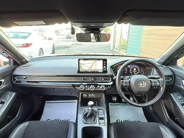 ホンダ シビック EX 香川県 2021(令3)年 4.1万km プレミアムクリスタルレッドM 純正9型コネクトナビ/・BT接続/TV/アダプティブドライビングビーム/BOSEプレミアムサウンドシステム/レザー×スウェードコンビシート/純正ドライブレコーダー/Honda SENSING/・ブラインドスポットモニター/・渋滞追従機能/10.2インチデジタルグラフィックメーター/パドルシフト/LEDフォグライト/ビルトインETC/スマホ連携/置くだけ充電/運転席8Way/助手席4Wayパワーシート/DN席ヒートシーター/社外2本出しマフラー