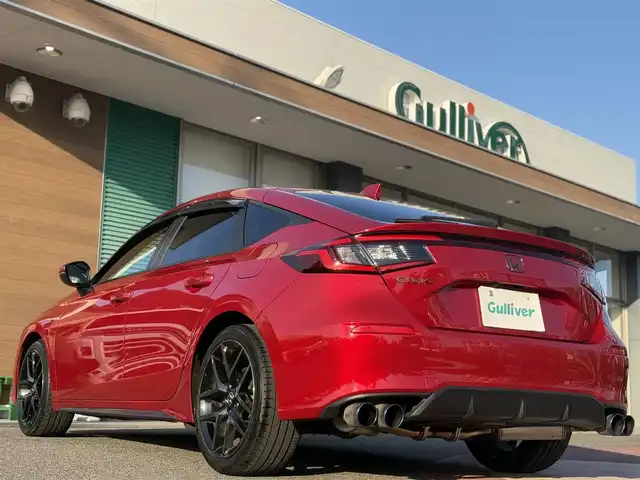 ホンダ シビック EX 香川県 2021(令3)年 4.1万km プレミアムクリスタルレッドM 純正9型コネクトナビ/・BT接続/TV/アダプティブドライビングビーム/BOSEプレミアムサウンドシステム/レザー×スウェードコンビシート/純正ドライブレコーダー/Honda SENSING/・ブラインドスポットモニター/・渋滞追従機能/10.2インチデジタルグラフィックメーター/パドルシフト/LEDフォグライト/ビルトインETC/スマホ連携/置くだけ充電/運転席8Way/助手席4Wayパワーシート/DN席ヒートシーター/社外2本出しマフラー