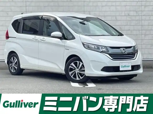 ホンダ フリード ハイブリット EX 福岡県 2018(平30)年 2.2万km ホワイトオーキッドパール 純正7型SDナビ(フルセグTV/CD/DVD/BT)バックモニタホンダセンシング両側電動パワスラレーダークルコンドラレコETCシートヒーター純正フロアマット純正LEDヘッドライト純正アルミホイールプッシュスタートスマートキー