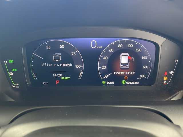 ホンダ ＺＲ－Ｖ ハイブリッド e:HEV Z 愛知県 2023(令5)年 0.7万km クリスタルブラックパール /禁煙車//純正HondaCONNECTディスプレイ//フルセグTV//ビルトインETC2.0//マルチビューカメラシステム//バックカメラ//本革シート//前席パワーシート・シートヒーター//運転席ポジションメモリー//BOSEプレミアムサウンドシステム//ハンズフリーパワーテールゲート//ホンダセンシング//衝突軽減ブレーキ(CMBS)//先行車発進お知らせ//歩行者事故低減ステアリング//路外逸脱抑制機能//標識認識機能//アダプティブクルーズコントロール//レーンキープアシストシステム//トラフィックジャムアシスト//誤発進抑制機能(前後方)//前後パーキングセンサー//オートハイビーム//アダプティブドライビングビーム//LEDヘッドライト//オートライト//ワイヤレス充電器//純正18インチアルミホイール(切削+ベルリナブラック塗装)//革巻きステアリング//ステアリングスイッチ//ステアリングヒーター//パドルシフト//純正フロアマット//純正ドアバイザー//プッシュスタート//電動格納ミラーウィンカー//横滑り防止装置