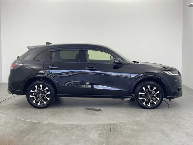 ホンダ ＺＲ－Ｖ ハイブリッド e:HEV Z 愛知県 2023(令5)年 0.7万km クリスタルブラックパール /禁煙車//純正HondaCONNECTディスプレイ//フルセグTV//ビルトインETC2.0//マルチビューカメラシステム//バックカメラ//本革シート//前席パワーシート・シートヒーター//運転席ポジションメモリー//BOSEプレミアムサウンドシステム//ハンズフリーパワーテールゲート//ホンダセンシング//衝突軽減ブレーキ(CMBS)//先行車発進お知らせ//歩行者事故低減ステアリング//路外逸脱抑制機能//標識認識機能//アダプティブクルーズコントロール//レーンキープアシストシステム//トラフィックジャムアシスト//誤発進抑制機能(前後方)//前後パーキングセンサー//オートハイビーム//アダプティブドライビングビーム//LEDヘッドライト//オートライト//ワイヤレス充電器//純正18インチアルミホイール(切削+ベルリナブラック塗装)//革巻きステアリング//ステアリングスイッチ//ステアリングヒーター//パドルシフト//純正フロアマット//純正ドアバイザー//プッシュスタート//電動格納ミラーウィンカー//横滑り防止装置
