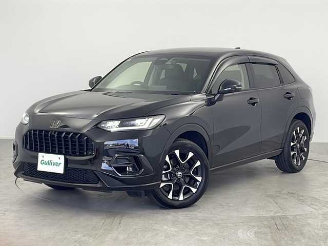 ホンダ ＺＲ－Ｖ ハイブリッド e:HEV Z 愛知県 2023(令5)年 0.7万km クリスタルブラックパール /禁煙車//純正HondaCONNECTディスプレイ//フルセグTV//ビルトインETC2.0//マルチビューカメラシステム//バックカメラ//本革シート//前席パワーシート・シートヒーター//運転席ポジションメモリー//BOSEプレミアムサウンドシステム//ハンズフリーパワーテールゲート//ホンダセンシング//衝突軽減ブレーキ(CMBS)//先行車発進お知らせ//歩行者事故低減ステアリング//路外逸脱抑制機能//標識認識機能//アダプティブクルーズコントロール//レーンキープアシストシステム//トラフィックジャムアシスト//誤発進抑制機能(前後方)//前後パーキングセンサー//オートハイビーム//アダプティブドライビングビーム//LEDヘッドライト//オートライト//ワイヤレス充電器//純正18インチアルミホイール(切削+ベルリナブラック塗装)//革巻きステアリング//ステアリングスイッチ//ステアリングヒーター//パドルシフト//純正フロアマット//純正ドアバイザー//プッシュスタート//電動格納ミラーウィンカー//横滑り防止装置