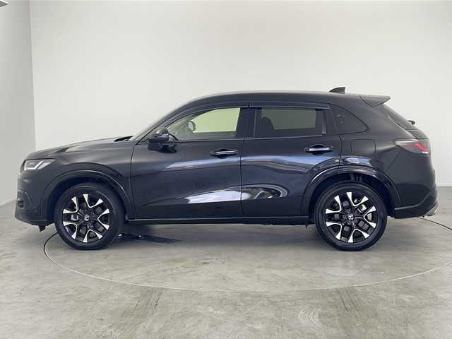 ホンダ ＺＲ－Ｖ ハイブリッド e:HEV Z 愛知県 2023(令5)年 0.7万km クリスタルブラックパール /禁煙車//純正HondaCONNECTディスプレイ//フルセグTV//ビルトインETC2.0//マルチビューカメラシステム//バックカメラ//本革シート//前席パワーシート・シートヒーター//運転席ポジションメモリー//BOSEプレミアムサウンドシステム//ハンズフリーパワーテールゲート//ホンダセンシング//衝突軽減ブレーキ(CMBS)//先行車発進お知らせ//歩行者事故低減ステアリング//路外逸脱抑制機能//標識認識機能//アダプティブクルーズコントロール//レーンキープアシストシステム//トラフィックジャムアシスト//誤発進抑制機能(前後方)//前後パーキングセンサー//オートハイビーム//アダプティブドライビングビーム//LEDヘッドライト//オートライト//ワイヤレス充電器//純正18インチアルミホイール(切削+ベルリナブラック塗装)//革巻きステアリング//ステアリングスイッチ//ステアリングヒーター//パドルシフト//純正フロアマット//純正ドアバイザー//プッシュスタート//電動格納ミラーウィンカー//横滑り防止装置