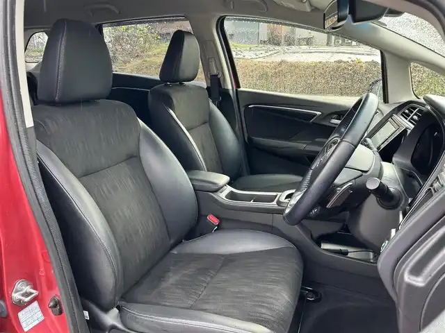 ホンダ シャトル ハイブリッド X ホンダセンシング 富山県 2020(令2)年 5.6万km プレミアムクリスタルレッドM ワンオーナー/純正SDナビ/(AM/FM/CD/DVD/BT/USB/ipod)/フルセグTV/バックカメラ/レーダークルーズコントロール/コーナーセンサー/衝突軽減システム/レーンキープアシスト/横滑り防止装置/盗難防止装置/パドルシフト/ビルトインETC/シートヒーター　運転席＋助手席/ハーフレザーシート/フロアマット社外/LEDライト/フォグランプ/カーテンエアバッグ/スマートキー×2/取扱説明書/保証書