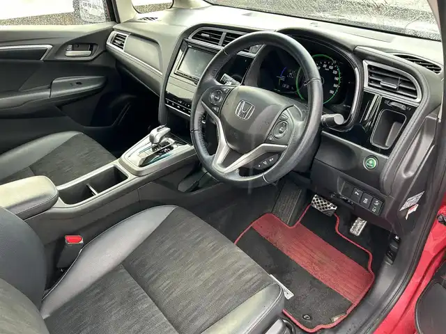 ホンダ シャトル ハイブリッド X ホンダセンシング 富山県 2020(令2)年 5.6万km プレミアムクリスタルレッドM ワンオーナー/純正SDナビ/(AM/FM/CD/DVD/BT/USB/ipod)/フルセグTV/バックカメラ/レーダークルーズコントロール/コーナーセンサー/衝突軽減システム/レーンキープアシスト/横滑り防止装置/盗難防止装置/パドルシフト/ビルトインETC/シートヒーター　運転席＋助手席/ハーフレザーシート/フロアマット社外/LEDライト/フォグランプ/カーテンエアバッグ/スマートキー×2/取扱説明書/保証書