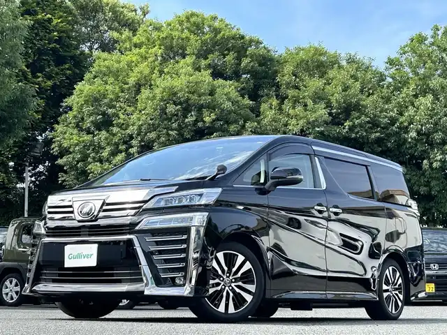 トヨタ ヴェルファイア Z Gエディション 宮崎県 2018(平30)年 2.6万km ブラック 純正SDナビ（NSZN-Z68T）/・Bluetoothオーディオ/USBオーディオ/・フルセグTV/SDオーディオ/バックカメラ/ツインムーンルーフ/三眼LEDヘッドランプ/・アダプティブハイビームシステム/後席用モニター/デジタルインナーミラー/パワーシート/シートヒーター/エアシート（前席）/パワーバックドア/両側パワースライドドア/ビルトインETC2.0/前後ドライブレコーダー（HDR963GW）/取扱説明書/保証書/スペアキー1本
