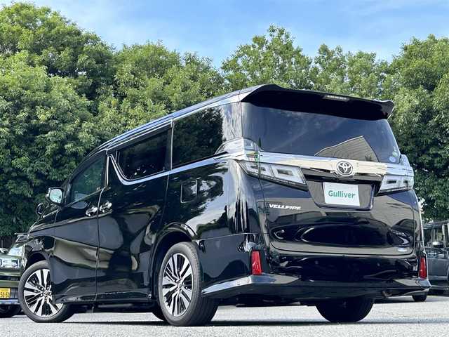 トヨタ ヴェルファイア Z Gエディション 宮崎県 2018(平30)年 2.6万km ブラック 純正SDナビ（NSZN-Z68T）/・Bluetoothオーディオ/USBオーディオ/・フルセグTV/SDオーディオ/バックカメラ/ツインムーンルーフ/三眼LEDヘッドランプ/・アダプティブハイビームシステム/後席用モニター/デジタルインナーミラー/パワーシート/シートヒーター/エアシート（前席）/パワーバックドア/両側パワースライドドア/ビルトインETC2.0/前後ドライブレコーダー（HDR963GW）/取扱説明書/保証書/スペアキー1本