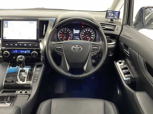 トヨタ ヴェルファイア Z Gエディション 宮崎県 2018(平30)年 2.6万km ブラック 禁煙車/トヨタセーフティセンス/純正10型ナビTV/（NSZN-Z68T/CD/DVD/Bluetooth/フルセグTV)/純正12.1型リアフリップダウンモニター/純正ビルトイン2.0ETC/純正LEDオートライト/純正LEDフォグ/純正18インチアルミ/純正オートアラーム/純正フロアマット/社外前後ドライブレコーダー/両側電動スライドドア/パワーバックドア/プリクラッシュセーフティ/アダプティブクルーズコントロール/レーンディパーチャーアラート/オートマチックハイビーム/クリアランスソナー/スマートルームミラー/Wサンルーフ/黒本革シート/前席パワーシート/エアシート/シートヒーター/リアエグゼクティブパワーシート/パワーバックドア/ウッドコンビ本革巻ハンドル/ステアリングヒーター/Wオートエアコン（ナノイー）/スマートキー/プッシュエンジンスタート/スペアキー/新車時保証書/取扱い説明書