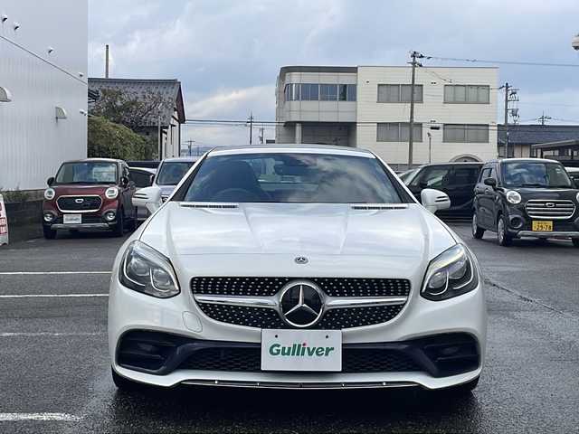 メルセデス・ベンツ ＳＬＣ１８０ スポーツ 福井県 2018(平30)年 3.2万km ポーラホワイト 登録時走行距離31216km/メーカー純正HDDナビゲーション/（CD/DVD/BT）/フルセグテレビ/バックカメラ/プリクラッシュセーフティ/アダプティブクルーズコントロール/ターボ/ブラインドスポットモニター/純正18インチアルミホイール/黒革シート/パワーシート/（シートメモリ付き）/シートヒーター/LEDヘッドライト/ETC/ドライブレコーダー/レインセンサー/LIMスイッチ/USBポート/オートリトラミラー/オートライト/ステアリングリモコン/プッシュスタート/スマートキー/保証書/取扱説明書