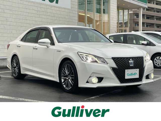トヨタ クラウン ハイブリッド アスリートS 静岡県 2014(平26)年 5.4万km ホワイトパールクリスタルシャイン 外部検査実施済み/純正HDDナビ/(DVD/フルセグTV/Bluetooth/MSV)/バックカメラ/ビルトインETC/前席パワーシート/前席シートヒーター/ステアリングヒーター/横滑り防止機能/純正18インチアルミホイール/スマートキー/HIDヘッドライト/カーテンエアバック/クルーズコントロール/取扱説明書/保証書/スペアキー