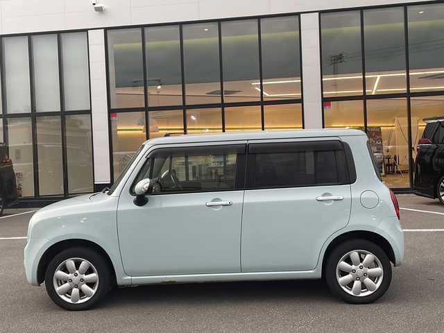スズキ ラパン TL 青森県 2013(平25)年 7.1万km アロマティックアクアメタリック ・4WD/・純正ナビ/・フルセグ/・CD/DVD/SD/・ABS/・オートライト/・プッシュスタート/・スマートキー/・スペアキー1本/・社外エンジンスターター/・ドライブレコーダー（前後）/・ETC/・ドアバイザー/・純正フロアマット/・AW14インチ車載