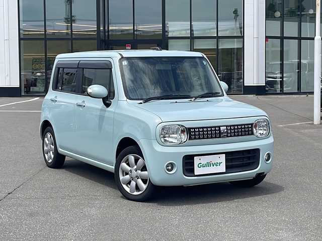 スズキ ラパン TL 青森県 2013(平25)年 7.1万km アロマティックアクアメタリック ・4WD/・純正ナビ/・フルセグ/・CD/DVD/SD/・ABS/・オートライト/・プッシュスタート/・スマートキー/・スペアキー1本/・社外エンジンスターター/・ドライブレコーダー（前後）/・ETC/・ドアバイザー/・純正フロアマット/・AW14インチ車載