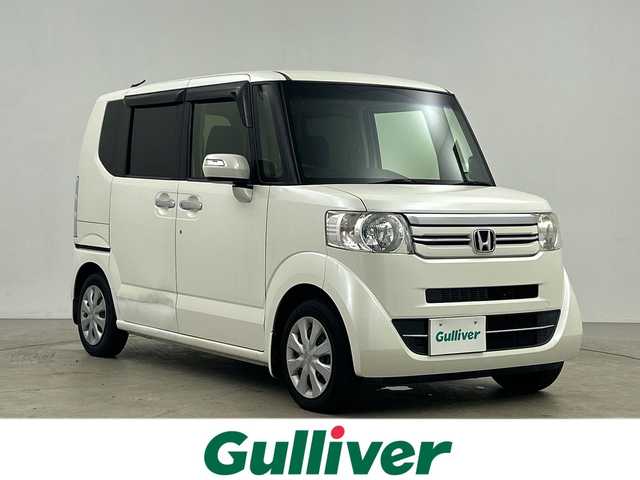 ホンダ Ｎ ＢＯＸ G SSパッケージ 鹿児島県 2016(平28)年 5万km プレミアムホワイトパールⅡ 純正ディーラーナビ/(BT/CD/DVD/AM/FM/フルセグTV)/バックカメラ/両側パワースライドドア/チップアップシート/前席シートヒーター/純正キセノンヘッドライト/純正サイドバイザー/純正フロアマット/オートライト/保証書/取扱説明書