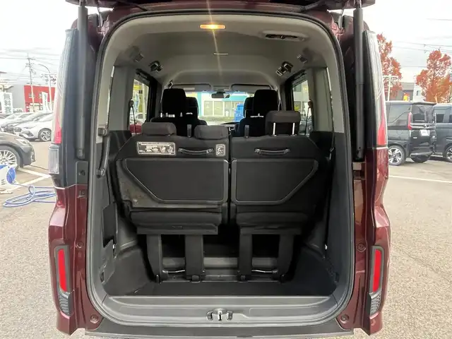 ホンダ ステップワゴン スパーダ ホンダセンシング 愛媛県 2017(平29)年 8.4万km プレミアムディープロッソパール 社外ナビ/BT/AM・FM/CD/DVD/フルセグTV/２列目リアモニター/ETC/ホンダセンシング/バックカメラ/追従型クルーズコントロール/レーンキープアシスト/両側パワースライドドア/アイドリングストップ/３列シート/オートライト/リモコンエンジンスターター/ステアリングスイッチ/ハンズフリー/純正アルミホイール/社外フロアマット