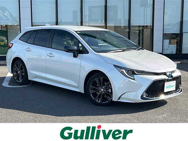 トヨタ カローラツーリング ハイブリッド ダブルバイビー 岐阜県 2021(令3)年 3.1万km プラチナホワイトパールマイカ 登録時走行距離　30240km/ナビ機能付きディスプレイオーディオ/バックモニター/Bluetooth接続/フルセグTV/社外前後ドライブレコーダー/シートヒーター/ステアリングヒーター/禁煙車/純正フロアマット/純正ETC/純正アルミホイール/ハーフレザーシート/オートマチックハイビーム/オートライト/フォグランプ/LEDヘッドライト/クルーズコントロール/衝突被害軽減システム/コーナーセンサー前後/ウインカーミラー/プッシュスタート/スマートキー/AAC/パワーウィンドウ/パワーステアリング/ハイブリッド