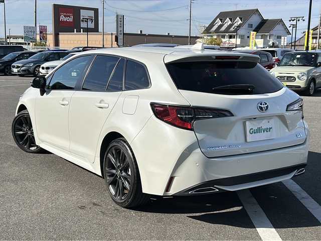 トヨタ カローラツーリング ハイブリッド ダブルバイビー 岐阜県 2021(令3)年 3.1万km プラチナホワイトパールマイカ 登録時走行距離　30240km/ナビ機能付きディスプレイオーディオ/バックモニター/Bluetooth接続/フルセグTV/社外前後ドライブレコーダー/シートヒーター/ステアリングヒーター/禁煙車/純正フロアマット/純正ETC/純正アルミホイール/ハーフレザーシート/オートマチックハイビーム/オートライト/フォグランプ/LEDヘッドライト/クルーズコントロール/衝突被害軽減システム/コーナーセンサー前後/ウインカーミラー/プッシュスタート/スマートキー/AAC/パワーウィンドウ/パワーステアリング/ハイブリッド