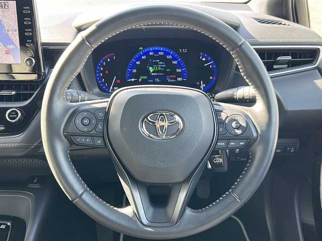 トヨタ カローラツーリング ハイブリッド ダブルバイビー 岐阜県 2021(令3)年 3.1万km プラチナホワイトパールマイカ 登録時走行距離　30240km/ナビ機能付きディスプレイオーディオ/バックモニター/Bluetooth接続/フルセグTV/社外前後ドライブレコーダー/シートヒーター/ステアリングヒーター/禁煙車/純正フロアマット/純正ETC/純正アルミホイール/ハーフレザーシート/オートマチックハイビーム/オートライト/フォグランプ/LEDヘッドライト/クルーズコントロール/衝突被害軽減システム/コーナーセンサー前後/ウインカーミラー/プッシュスタート/スマートキー/AAC/パワーウィンドウ/パワーステアリング/ハイブリッド