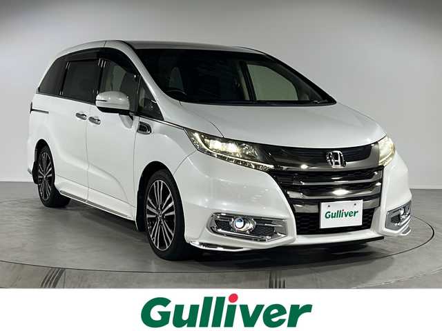 ホンダ オデッセイ アブソルート・EXホンダセンジング 福岡県 2017(平29)年 7.5万km ホワイトオーキッドパール ・フルセグTV/・ipod/・Bluetooth/・Bカメラ/・ブラインドスポットアシスト/・純正ナビ/・コーナーセンサー/・フリップダウン/・18インチ純正ホイール/・ETC/・ACC/・パドルシフト/・レザーシート/・CD/DVD