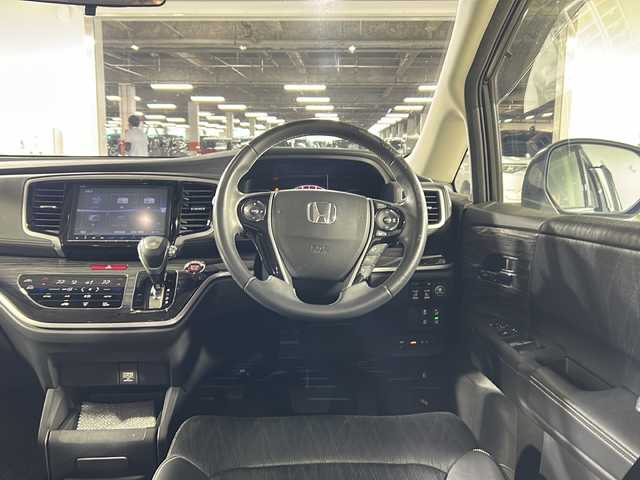 ホンダ オデッセイ アブソルート・EXホンダセンジング 福岡県 2017(平29)年 7.5万km ホワイトオーキッドパール ・フルセグTV/・ipod/・Bluetooth/・Bカメラ/・ブラインドスポットアシスト/・純正ナビ/・コーナーセンサー/・フリップダウン/・18インチ純正ホイール/・ETC/・ACC/・パドルシフト/・レザーシート/・CD/DVD