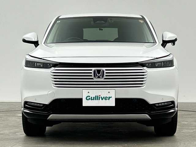 ホンダ ヴェゼル ハイブリッド e:HEV Z 三重県 2024(令6)年 0.8万km プラチナホワイトパール /禁煙車//純正ナビ/・フルセグ・Bluetooth・USB・AppleCarPlay・AndroidAuto//バックカメラ//ホンダセンシング//ブラインドスポットインフォメーション//アダプティブクルーズコントロール//オートハイビーム//衝突軽減ブレーキ//車線維持支援システム//ハンズフリーアクセスパワーテールゲート//前席シートヒーター//ビルトインETC2.0//前後ドライブレコーダー//ワイヤレスチャージャー//電子パーキング//ブレーキホールド//パドルシフト//ステアリングヒーター