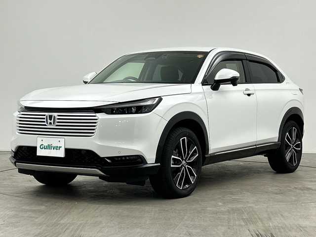 ホンダ ヴェゼル ハイブリッド e:HEV Z 三重県 2024(令6)年 0.8万km プラチナホワイトパール /禁煙車//純正ナビ/・フルセグ・Bluetooth・USB・AppleCarPlay・AndroidAuto//バックカメラ//ホンダセンシング//ブラインドスポットインフォメーション//アダプティブクルーズコントロール//オートハイビーム//衝突軽減ブレーキ//車線維持支援システム//ハンズフリーアクセスパワーテールゲート//前席シートヒーター//ビルトインETC2.0//前後ドライブレコーダー//ワイヤレスチャージャー//電子パーキング//ブレーキホールド//パドルシフト//ステアリングヒーター