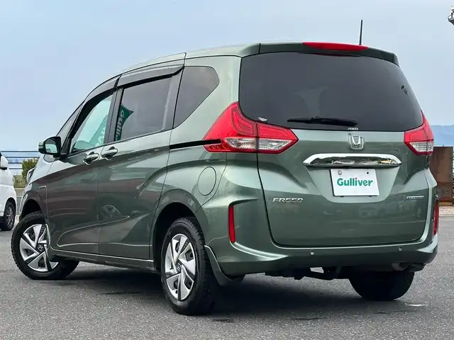 ホンダ フリード ハイブリット G ホンダセンシング 島根県 2021(令3)年 2.8万km シルバーミストグリーンM 純正ナビ/CD/DVD/DTV/Bluetooth/バックカメラ/両側パワースライドドア /レーダークルーズコントロール/純正ホイール付きサマータイヤ積込/LEDオートライト/前後ドライブレコーダー/ビルトインETC/フロントワイパーデアイサー /ステアリングスイッチ/スマートキー/スペアキー /純正フロアマット/ドアバイザー/コーナーセンサー